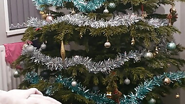 Stepmom helps stepson jerk off on Christmas Tree