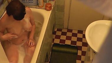 Stepmom goes to bathroom, wanks pussy, Student stepson spies