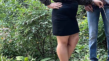 Mommy holds stepson's cock while he pisses outside