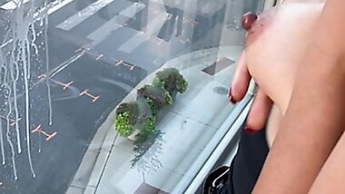 Downtown city window BREASTMILK squirt