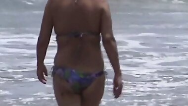 My wife enjoys the beach with her friend's son and has sex
