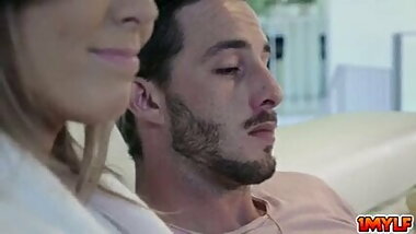 Mom and stepson watching late night movie